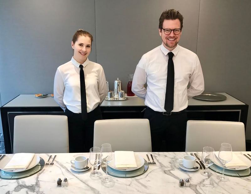 Servers at formal catered New York City event.